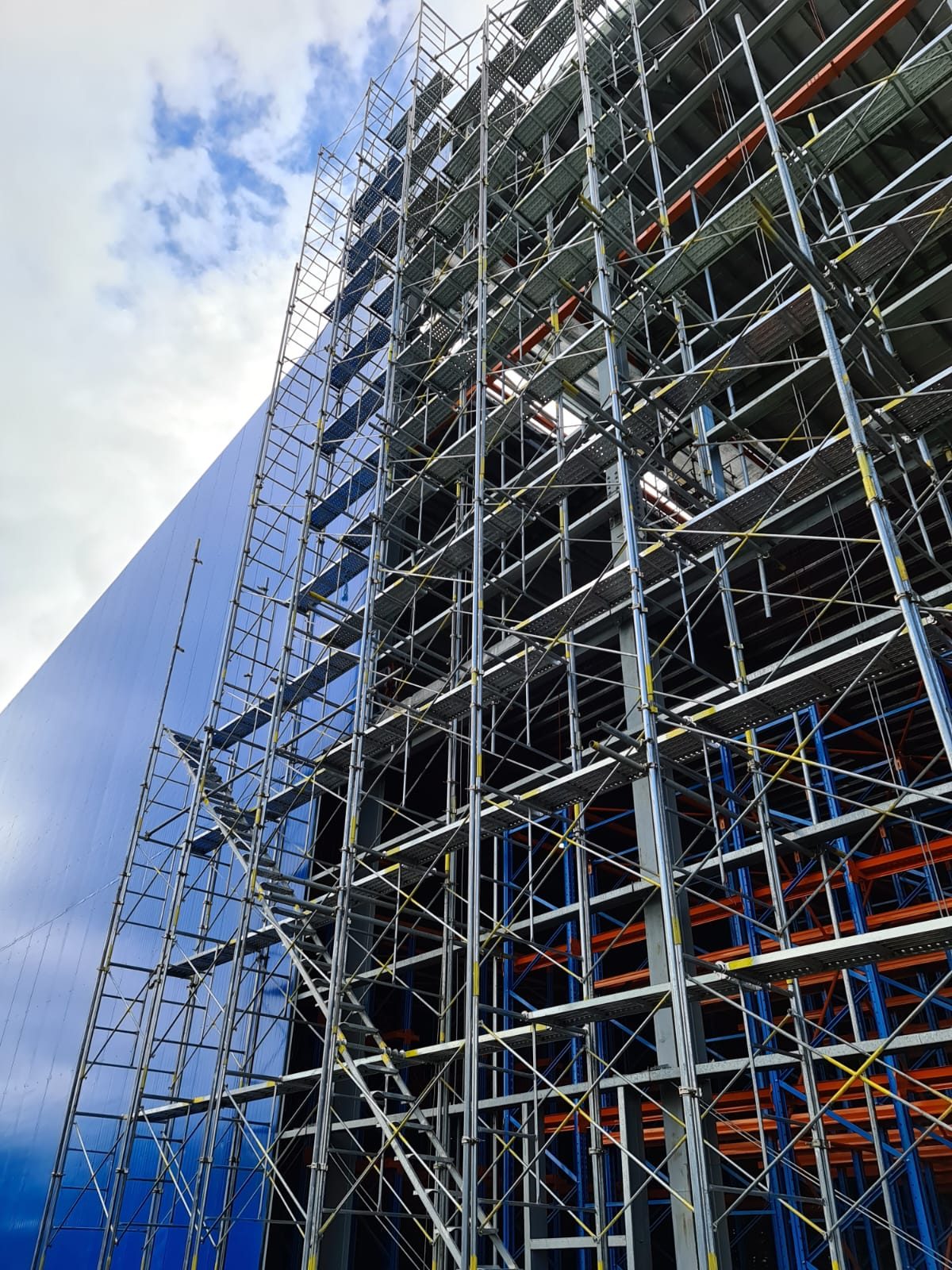 Insulated wall panel installation in progress
