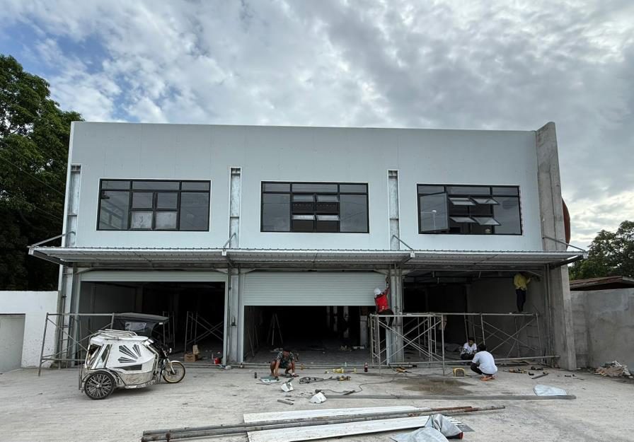 Commercial building with shopfronts and warehouse, Batangas